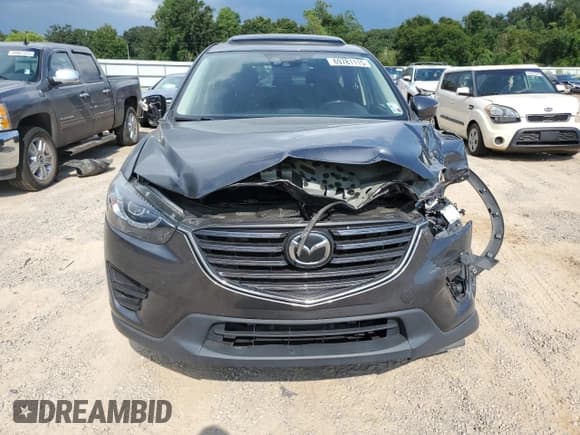 ✅ 2016 Mazda CX-5 Grand Touring • VIN: JM3KE2DY0G0850105 • Lot: 69781115. Listed on Copart with 86,615 mi. Free auction sales archive from the USA and detailed vehicle history report at DreamBid. Image 5.