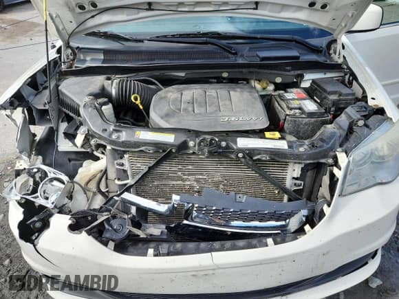 ✅ 2012 Dodge Grand Caravan Crew • VIN: 2C4RDGDG2CR131985 • Лот: 85852515. Опубликован ранее на Copart с пробегом 153 453 миль. Бесплатный доступ к архиву аукционных продаж из США и подробный отчёт об истории автомобиля на DreamBid. Изображение 12.