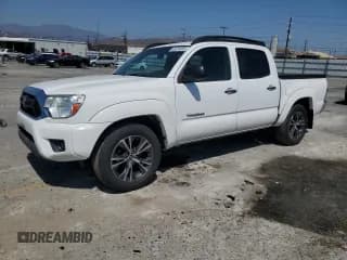 ✅ 2014 Toyota Tacoma • VIN: 5TFJX4CN5EX037011 • Lot: 63279335. Listed on Copart with 126,694 mi. Free auction sales archive from the USA and detailed vehicle history report at DreamBid. Image 1.