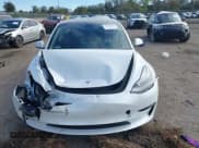 ✅ 2021 Tesla Model 3 Standard Range Plus • VIN: 5YJ3E1EA5MF086418 • Lot: 41252902. Wystawiony na IAAI z przebiegiem 7 858 mil. Bezpłatny archiwum sprzedaży aukcyjnych z USA i szczegółowy raport historii pojazdu na DreamBid. Zdjęcie 12.