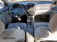 ✅ 2009 Kia Spectra EX • VIN: KNAFE221095654801 • Лот: 85313075. Опубликован ранее на Copart с пробегом 160 427 миль. Бесплатный доступ к архиву аукционных продаж из США и подробный отчёт об истории автомобиля на DreamBid. Изображение 8.