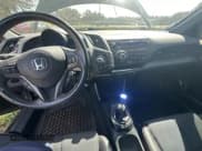 ✅ 2014 Honda CR-Z EX • VIN: JHMZF1C62ES000636 • Lot: 77877594. Listed on Copart with 78,261 mi. Free auction sales archive from the USA and detailed vehicle history report at DreamBid. Image 9.