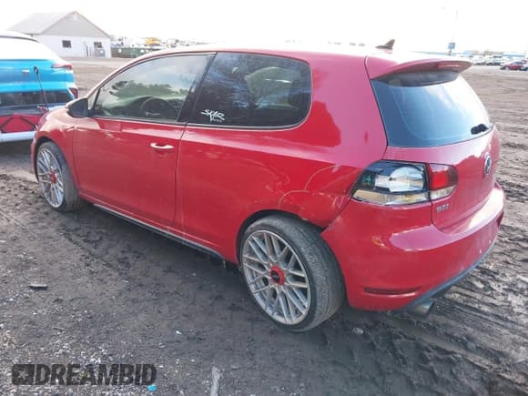 ✅ 2012 Volkswagen Golf GTI w/Conv & Sunroof • VIN: WVWEV7AJ9CW292286 • Lot: 41478359. Listed on IAAI with 153,000 mi. Free auction sales archive from the USA and detailed vehicle history report at DreamBid. Image 3.
