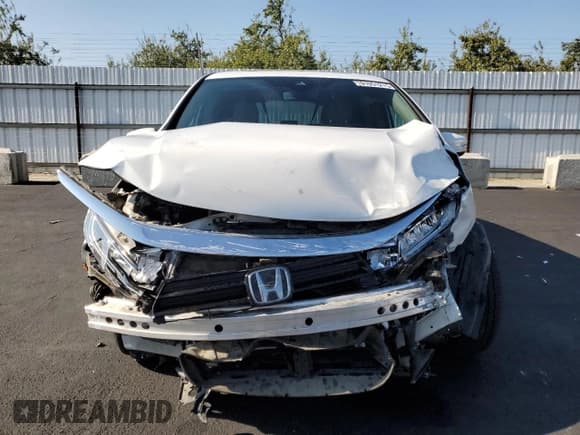 ✅ 2023 Honda Odyssey Touring • VIN: 5FNRL6H80PB028193 • Lot: 91051215. Listed on Copart with 60,633 mi. Free auction sales archive from the USA and detailed vehicle history report at DreamBid. Image 5.