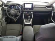 ✅ 2023 Toyota RAV4 Hybrid Woodland • VIN: 2T3UWRFV6PW151275 • Лот: 84451825. Опубликован ранее на Copart с пробегом 71 713 миль. Бесплатный доступ к архиву аукционных продаж из США и подробный отчёт об истории автомобиля на DreamBid. Изображение 8.