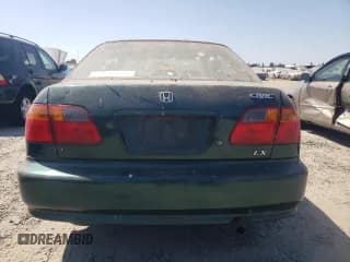 ✅ 1999 Honda Civic LX • VIN: 2HGEJ6679XH562416 • Lot: 63020124. Listed on Copart with 216,278 mi. Free auction sales archive from the USA and detailed vehicle history report at DreamBid. Image 6.