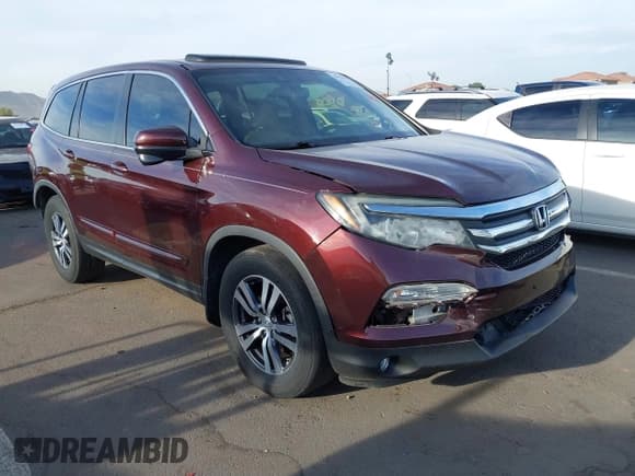 ✅ 2017 Honda Pilot EX-L • VIN: 5FNYF5H71HB027558 • Lot: 41910670. Listed on IAAI with 122,214 mi. Free auction sales archive from the USA and detailed vehicle history report at DreamBid. Image 1.
