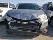 ✅ 2020 Chevrolet Traverse LS • VIN: 1GNERFKW1LJ188274 • Lot: 61883834. Wystawiony na Copart z przebiegiem 60 330 mil. Bezpłatny archiwum sprzedaży aukcyjnych z USA i szczegółowy raport historii pojazdu na DreamBid. Zdjęcie 5.