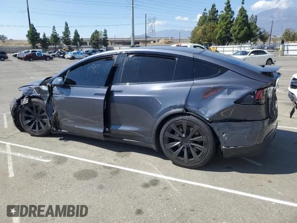 ✅ 2022 Tesla Model X • VIN: 7SAXCDE53NF337002 • Lot: 70912525. Wystawiony na Copart z przebiegiem Nie podano. Bezpłatny archiwum sprzedaży aukcyjnych z USA i szczegółowy raport historii pojazdu na DreamBid. Zdjęcie 2.