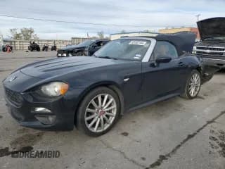 ✅ 2017 FIAT 124 Spider Classica • VIN: JC1NFAEK1H0107572 • Lot: 82452144. Listed on Copart with 98,954 mi. Free auction sales archive from the USA and detailed vehicle history report at DreamBid. Image 1.