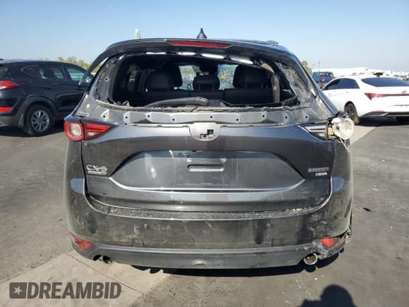 ✅ 2021 Mazda CX-5 Signature • VIN: JM3KFBEY1M0425242 • Lot: 91067215. Wystawiony na Copart z przebiegiem 77 579 mil. Bezpłatny archiwum sprzedaży aukcyjnych z USA i szczegółowy raport historii pojazdu na DreamBid. Zdjęcie 6.