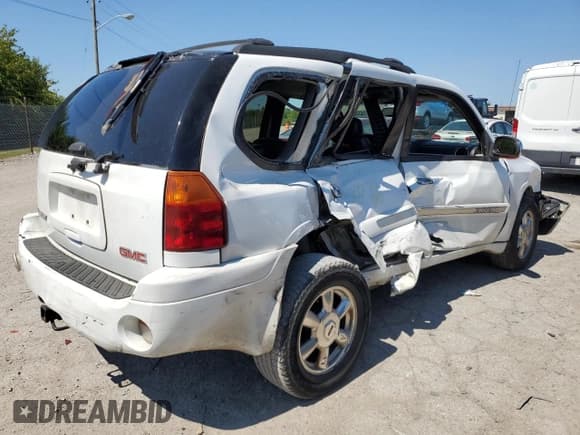 ✅ 2003 GMC Envoy SLE • VIN: 1GKDT13S932310270 • Лот: 71433535. Опубликован ранее на Copart с пробегом 218 786 миль. Бесплатный доступ к архиву аукционных продаж из США и подробный отчёт об истории автомобиля на DreamBid. Изображение 3.
