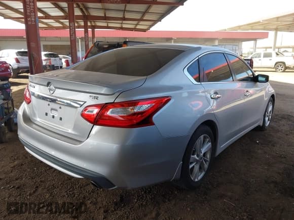 ✅ 2016 Nissan Altima SR • VIN: 1N4AL3AP5GC285527 • Lot: 43588837. Listed on IAAI with 96,599 mi. Free auction sales archive from the USA and detailed vehicle history report at DreamBid. Image 4.