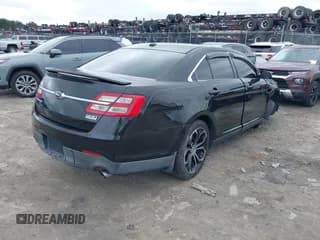 ✅ 2013 Ford Taurus SHO • VIN: 1FAHP2KT1DG133340 • Lot: 42918978. Listed on IAAI with 147,719 mi. Free auction sales archive from the USA and detailed vehicle history report at DreamBid. Image 4.