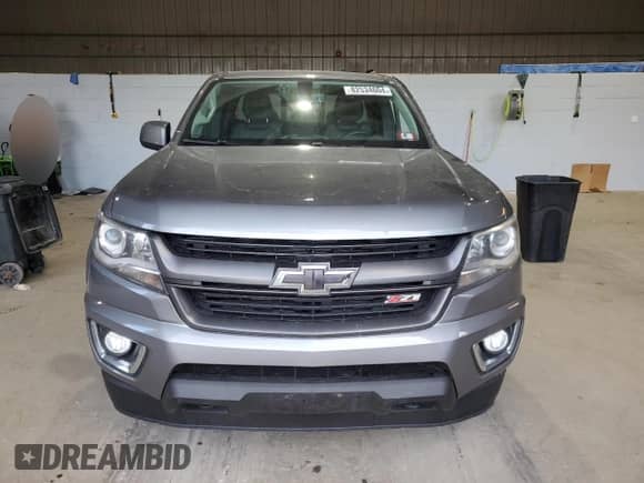 2018 Chevrolet Colorado 4WD Z71 with VIN 1GCHTDENXJ1143331, listed as a Copart auction lot 82534604 with 96,846 mi miles and Salvage title. Bid and sale history available at DreamBid. Image 5.