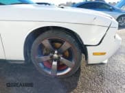 ✅ 2013 Dodge Challenger Rallye Redline • VIN: 2C3CDYAG7DH540639 • Lot: 40891888. Wystawiony na IAAI z przebiegiem 129 526 mil. Bezpłatny archiwum sprzedaży aukcyjnych z USA i szczegółowy raport historii pojazdu na DreamBid. Zdjęcie 6.