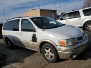 ✅ 2003 Pontiac Montana 1SA • VIN: 1GMDX03E73D164410 • Lot: 43681555. Wystawiony na Copart z przebiegiem 229 771 mil. Bezpłatny archiwum sprzedaży aukcyjnych z USA i szczegółowy raport historii pojazdu na DreamBid. Zdjęcie 4.