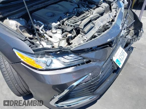 2022 Toyota Camry Hybrid XLE with VIN 4T1F31AK4NU571560, listed as a IAAI auction lot 42654973 with 10,810 mi miles and . Bid and sale history available at DreamBid. Image 17.