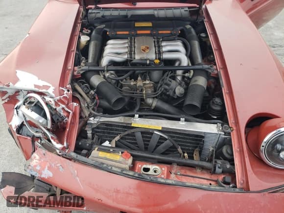 ✅ 1983 Porsche 928 • VIN: WP0JB0921DS861698 • Лот: 90683325. Опубликован ранее на Copart с пробегом 98 779 миль. Бесплатный доступ к архиву аукционных продаж из США и подробный отчёт об истории автомобиля на DreamBid. Изображение 11.