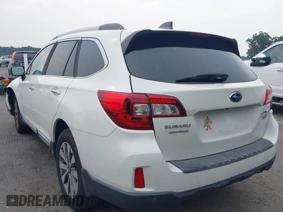 ✅ 2017 Subaru Outback Touring • VIN: 4S4BSETC2H3341332 • Lot: 42895227. Listed on IAAI with 101,057 mi. Free auction sales archive from the USA and detailed vehicle history report at DreamBid. Image 3.