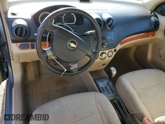 2007 Chevrolet Aveo LS z VIN KL1TD56697B076719, wystawiony jako Copart lot #83921264 z przebiegiem 109 183 mil mil oraz Szkoda całkowita • Salvage title. Historia ofert i sprzedaży dostępna na DreamBid. Obrazek 8.