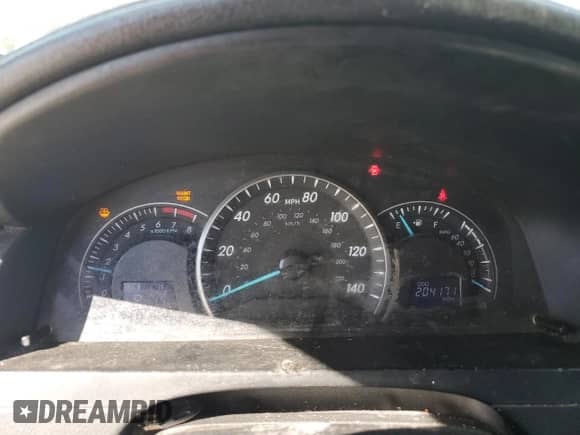 2012 Toyota Camry L z VIN 4T4BF1FK4CR245338, wystawiony jako Copart lot #89909825 z przebiegiem 204 171 mil mil oraz Czysty tytuł • Clean title. Historia ofert i sprzedaży dostępna na DreamBid. Obrazek 9.