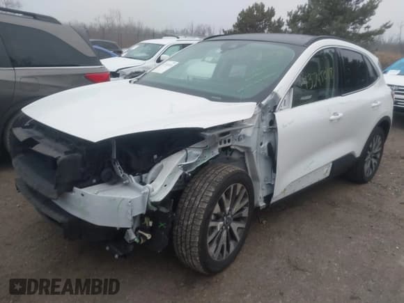 ✅ 2020 Ford Escape Titanium • VIN: 1FMCU9J98LUA08973 • Lot: 43745018. Listed on IAAI with 47,121 mi. Free auction sales archive from the USA and detailed vehicle history report at DreamBid. Image 17.