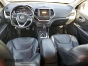 ✅ 2014 Jeep Cherokee Trailhawk • VIN: 1C4PJMBS6EW277774 • Lot: 93860515. Listed on Copart with 164,006 mi. Free auction sales archive from the USA and detailed vehicle history report at DreamBid. Image 8.