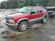 1999 Chevrolet Blazer LT with VIN 1GNDT13W7X2243230, listed as a Copart auction lot 57298805 with 230,907 mi miles and Salvage title. Bid and sale history available at DreamBid. Image 1.