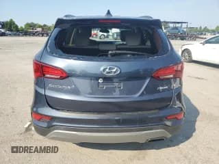 ✅ 2017 Hyundai Santa Fe 2.4L • VIN: 5NMZU3LBXHH009830 • Лот: 69410825. Опубликован ранее на Copart с пробегом 94 847 миль. Бесплатный доступ к архиву аукционных продаж из США и подробный отчёт об истории автомобиля на DreamBid. Изображение 6.