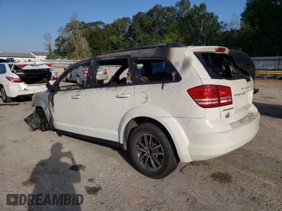 2018 Dodge Journey SE z VIN 3C4PDCAB7JT429029, wystawiony jako Copart lot #85104305 z przebiegiem Nie podano mil oraz Szkoda całkowita • Salvage title. Historia ofert i sprzedaży dostępna na DreamBid. Obrazek 2.