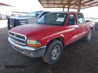 2002 Dodge Dakota SLT z VIN 1B7HL48X72S542335, wystawiony jako IAAI lot #43320738 z przebiegiem 239 957 mil mil oraz . Historia ofert i sprzedaży dostępna na DreamBid. Obrazek 2.