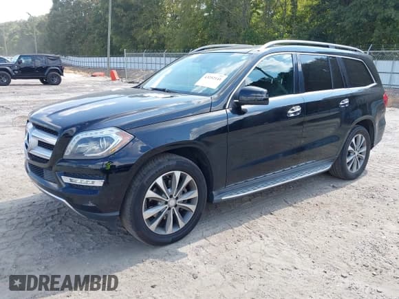 ✅ 2015 Mercedes-Benz GL 450 • VIN: 4JGDF6EEXFA483213 • Lot: 43252141. Listed on IAAI with 129,633 mi. Free auction sales archive from the USA and detailed vehicle history report at DreamBid. Image 2.