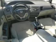 ✅ 2012 Honda Civic • VIN: JHMFB4F28CS011338 • Lot: 82193365. Listed on Copart with 79,642 mi. Free auction sales archive from the USA and detailed vehicle history report at DreamBid. Image 8.