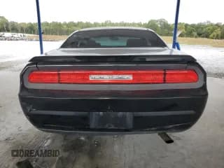 ✅ 2010 Dodge Challenger SE • VIN: 2B3CJ4DV8AH225045 • Лот: 85713465. Опубликован ранее на Copart с пробегом 144 323 миль. Бесплатный доступ к архиву аукционных продаж из США и подробный отчёт об истории автомобиля на DreamBid. Изображение 6.