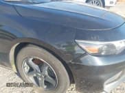 ✅ 2016 Chevrolet Malibu LS • VIN: 1G1ZB5ST1GF281117 • Lot: 43177666. Listed on IAAI with 141,406 mi. Free auction sales archive from the USA and detailed vehicle history report at DreamBid. Image 18.