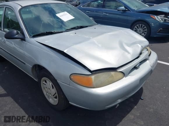 ✅ 1999 Ford Escort LX • VIN: 1FAFP10P6XW164410 • Lot: 42935825. Listed on IAAI with 159,409 mi. Free auction sales archive from the USA and detailed vehicle history report at DreamBid. Image 14.