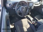 ✅ 2016 Jeep Wrangler Arctic • VIN: 1C4GJWBG2GL174511 • Лот: 50735425. Опубликован ранее на Copart с пробегом 64 281 миль. Бесплатный доступ к архиву аукционных продаж из США и подробный отчёт об истории автомобиля на DreamBid. Изображение 8.