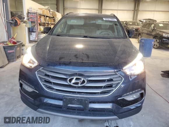 ✅ 2017 Hyundai Santa Fe 2.4L • VIN: 5XYZUDLB8HG420675 • Лот: 90927905. Опубликован ранее на Copart с пробегом 64 271 миль. Бесплатный доступ к архиву аукционных продаж из США и подробный отчёт об истории автомобиля на DreamBid. Изображение 5.