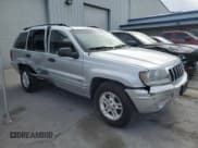 ✅ 2002 Jeep Grand Cherokee Laredo • VIN: 1J4GW48N32C254835 • Lot: 56066495. Listed on Copart with Not provided. Free auction sales archive from the USA and detailed vehicle history report at DreamBid. Image 4.