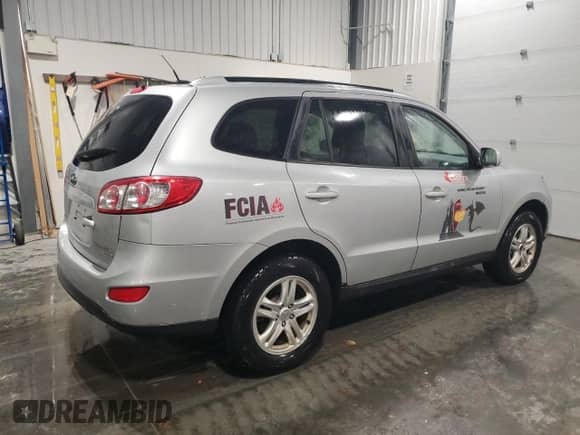✅ 2010 Hyundai Santa Fe GL • VIN: 5NMSGDAG0AH377291 • Лот: 90657505. Размещён на Copart с пробегом 282 446 миль миль. Получите бесплатный доступ к архиву аукционных продаж из США и посмотрите подробный отчёт об истории автомобиля на DreamBid. Изображение 3.