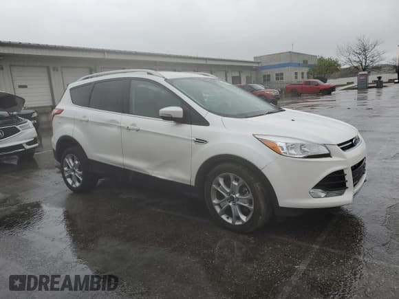 ✅ 2015 Ford Escape Titanium • VIN: 1FMCU9J94FUC55749 • Lot: 91058655. Listed on Copart with 80,886 mi. Free auction sales archive from the USA and detailed vehicle history report at DreamBid. Image 4.