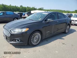 ✅ 2013 Ford Fusion Titanium Hybrid • VIN: 3FA6P0RU9DR289385 • Lot: 59378655. Wystawiony na Copart z przebiegiem 166 787 mil. Bezpłatny archiwum sprzedaży aukcyjnych z USA i szczegółowy raport historii pojazdu na DreamBid. Zdjęcie 1.