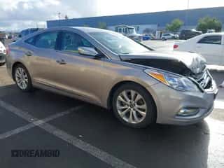 2013 Hyundai Azera z VIN KMHFG4JG4DA200108, wystawiony jako IAAI lot #41106201 z przebiegiem 79 920 mil mil oraz . Historia ofert i sprzedaży dostępna na DreamBid. Obrazek 1.