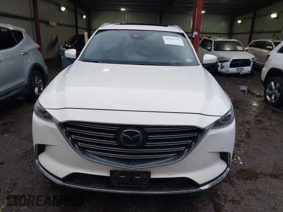 ✅ 2019 Mazda CX-9 Grand Touring • VIN: JM3TCBDY4K0303602 • Lot: 43563726. Wystawiony na IAAI z przebiegiem 124 038 mil. Bezpłatny archiwum sprzedaży aukcyjnych z USA i szczegółowy raport historii pojazdu na DreamBid. Zdjęcie 12.