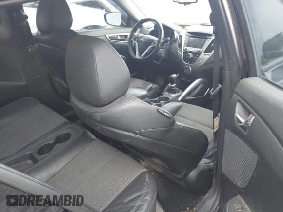 ✅ 2013 Hyundai Veloster w/Black Int • VIN: KMHTC6AD7DU092257 • Lot: 41464977. Wystawiony na IAAI z przebiegiem 151 152 mil. Bezpłatny archiwum sprzedaży aukcyjnych z USA i szczegółowy raport historii pojazdu na DreamBid. Zdjęcie 8.