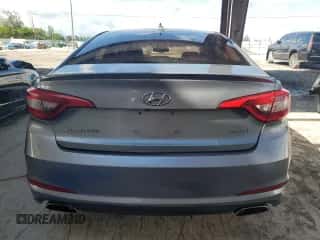 2015 Hyundai Sonata Sport с VIN 5NPE34AF0FH251233, выставлен на аукционе Copart как лот 85766045 с пробегом 114 579 миль миль и Списание • Salvage title. История ставок и продаж доступна на DreamBid. Изображение 6.