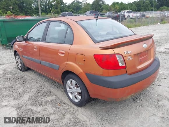 ✅ 2009 Kia Rio LX • VIN: KNADE223096451359 • Lot: 42954531. Listed on IAAI with 133,330 mi. Free auction sales archive from the USA and detailed vehicle history report at DreamBid. Image 3.