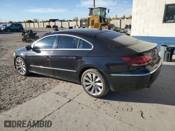 ✅ 2013 Volkswagen CC Executive • VIN: WVWGU7ANXDE527817 • Lot: 85360175. Listed on Copart with 179,122 mi. Free auction sales archive from the USA and detailed vehicle history report at DreamBid. Image 2.