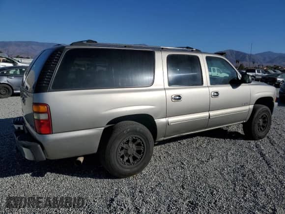 2000 Chevrolet Suburban LS с VIN 3GNEC16TXYG190988, выставлен на аукционе Copart как лот 80372284 с пробегом 152 279 миль миль и Списание • Salvage title. История ставок и продаж доступна на DreamBid. Изображение 3.